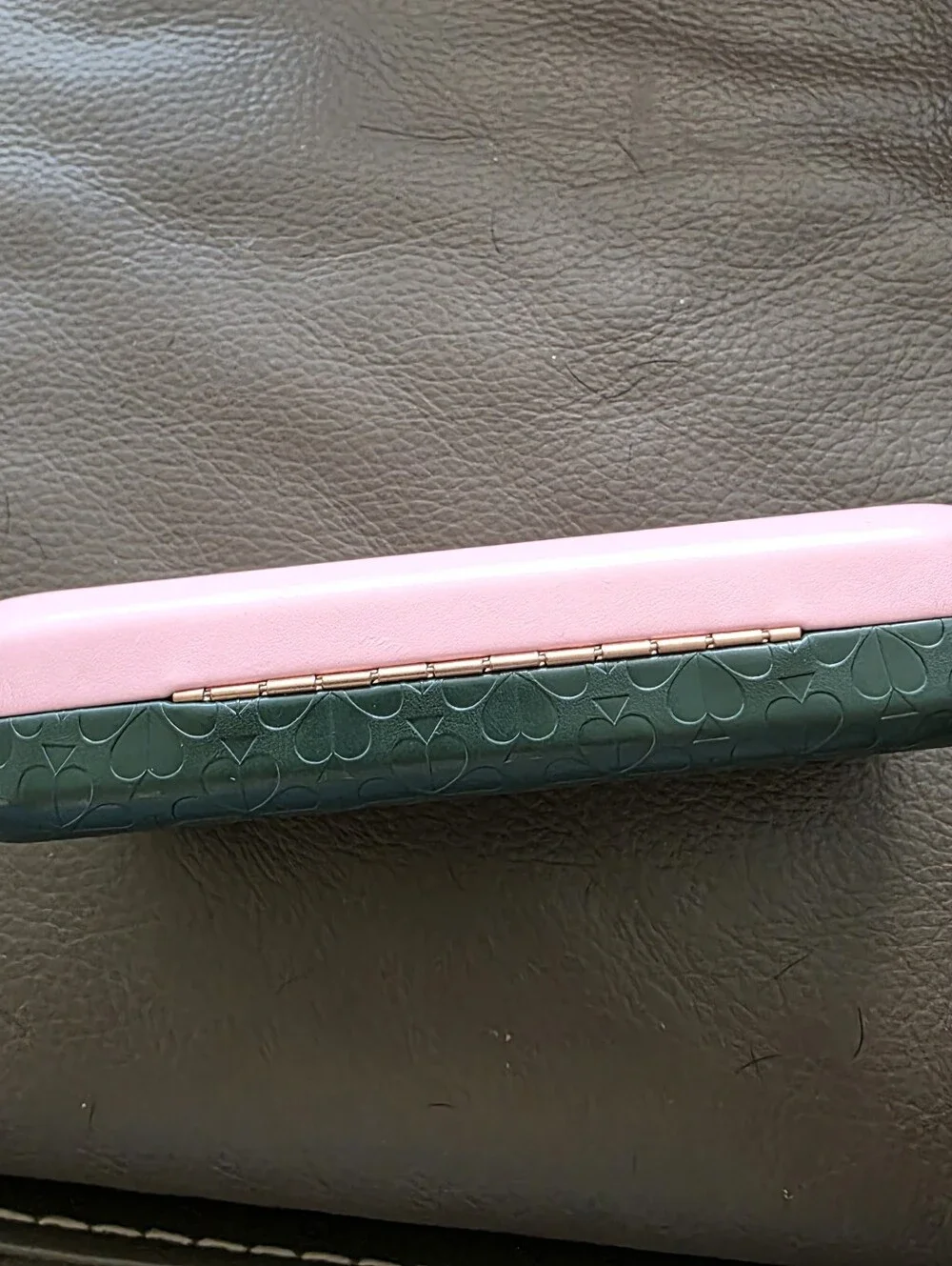 Kate Spade New York hard-shell eyeglasses case  Pink And green.